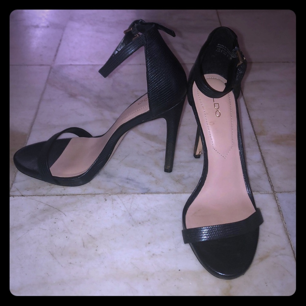 Snake skin strap heel.
